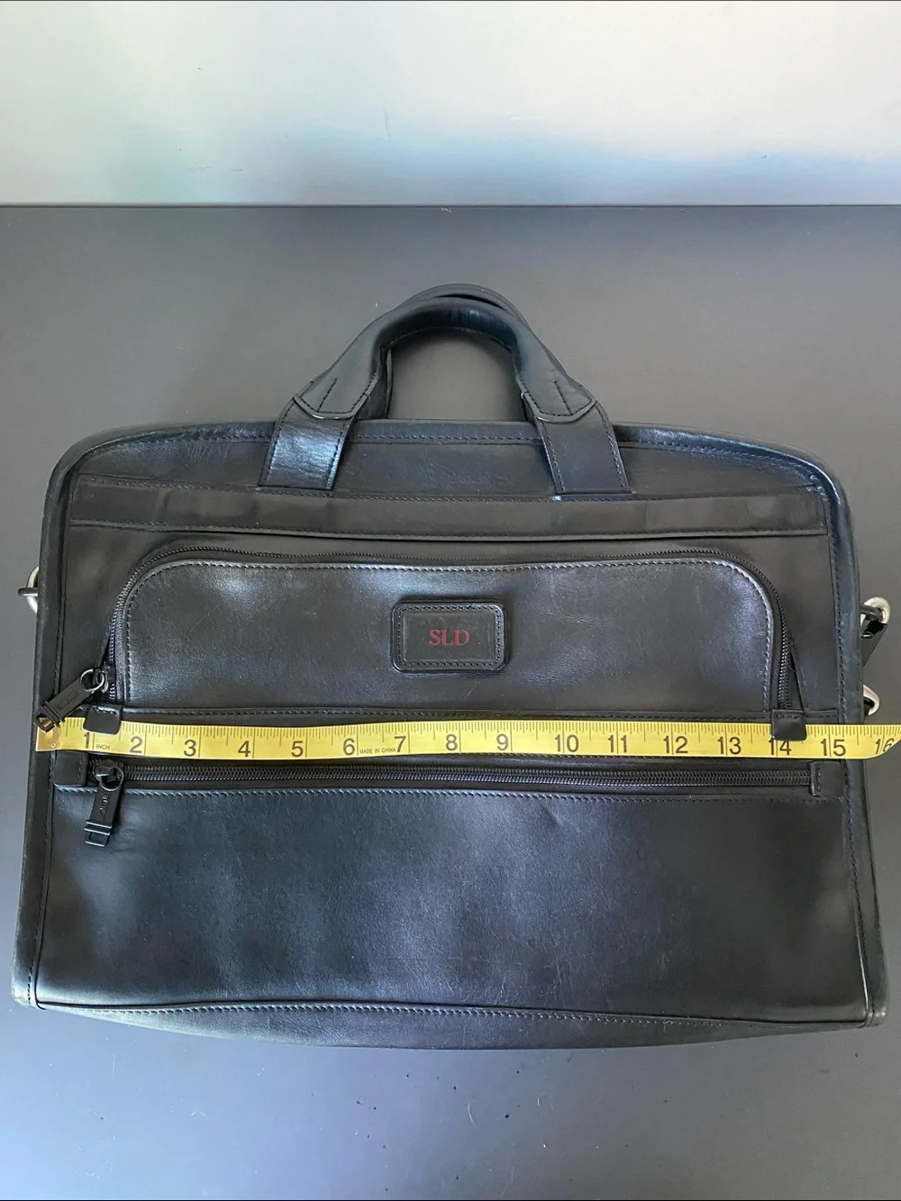 Tumi Alpha Slim Black Leather Portfolio Briefcase 17” Laptop Strap Pockets Sleek
